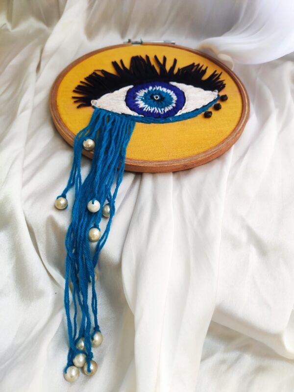 embroidered hoop art of evil eye