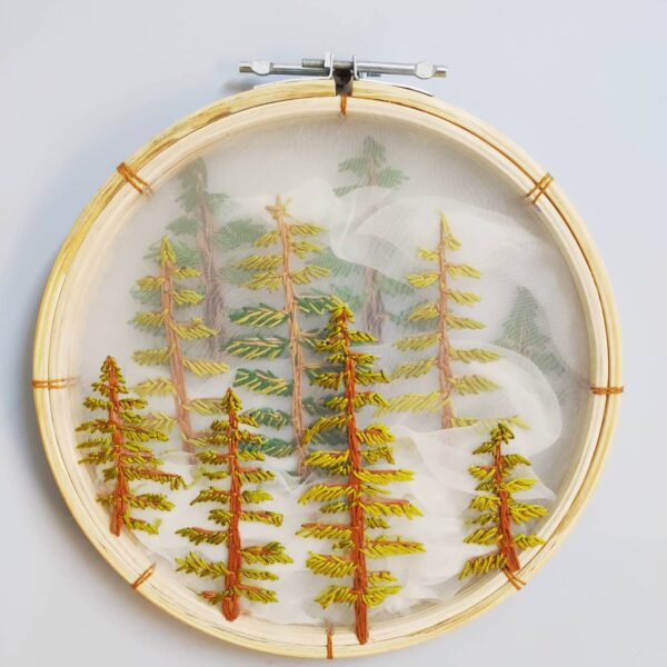 embroidered hoop art of pine trees with triple layer 3d embroidery