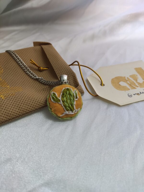cactus embroidered pendant