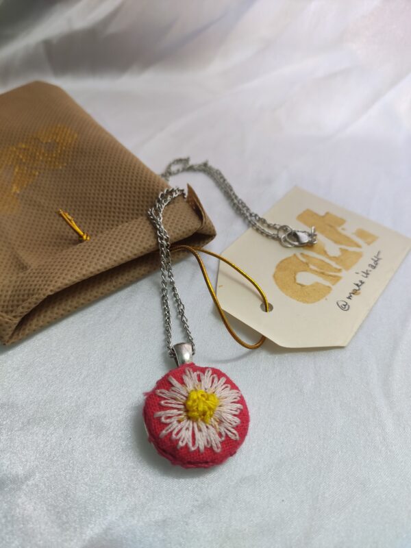 flower embroidered pendant