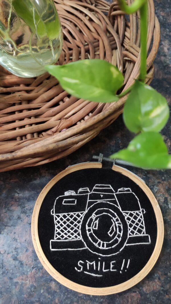 embroidered hoop art camera saying smile