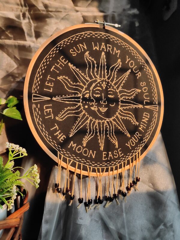 embroidered hoop art of sun moon