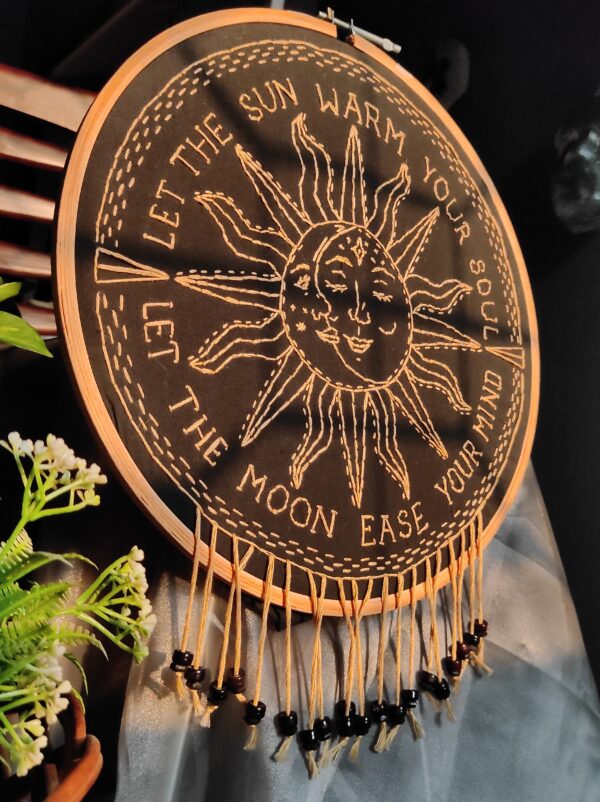 embroidered hoop art of sun moon