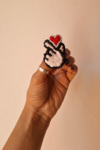 pinch of love brooch